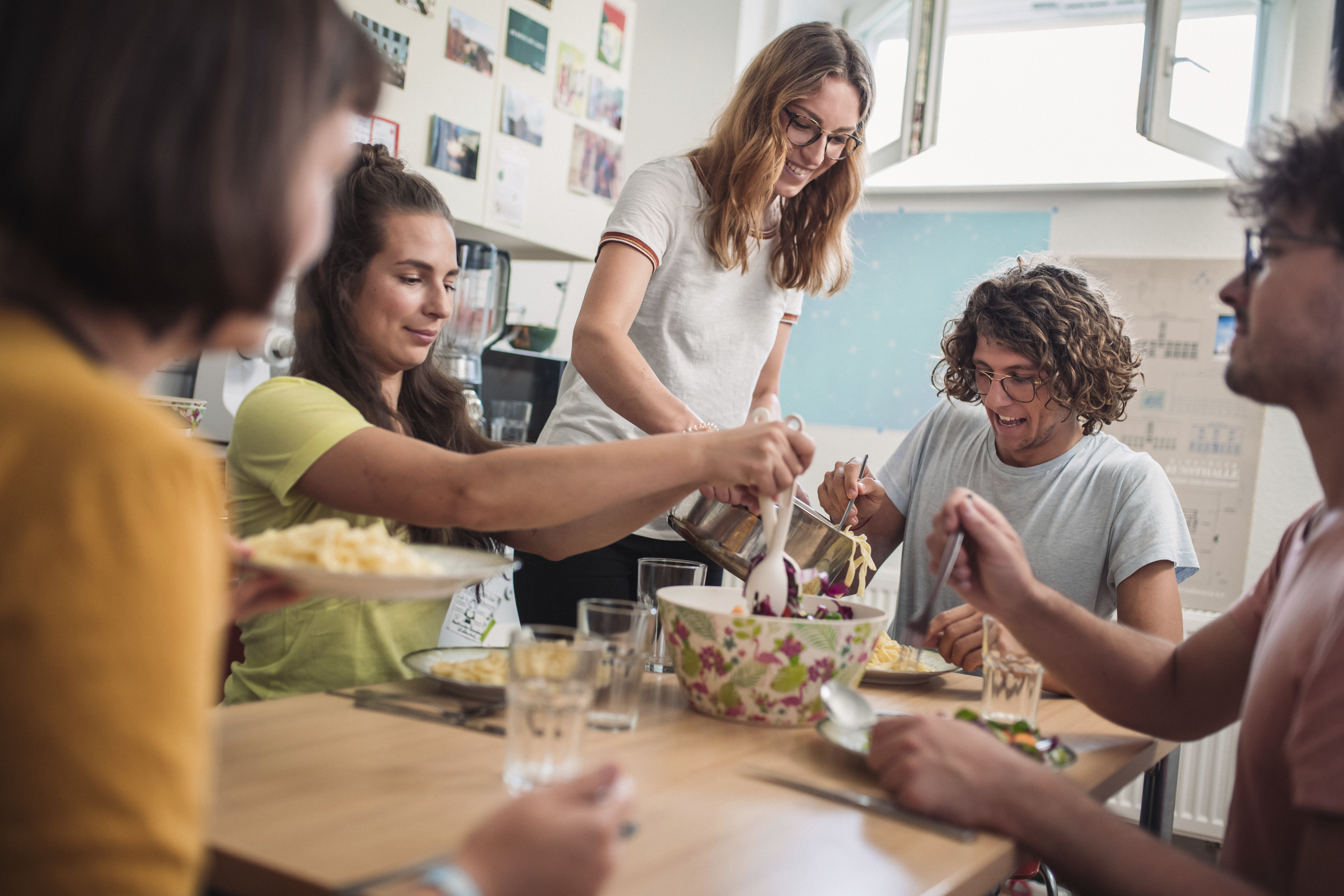students cooking together at the student housing